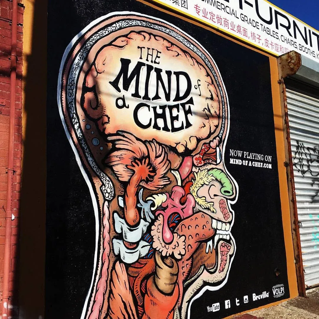 The Mind of a Chef billboard photographed on a city street
